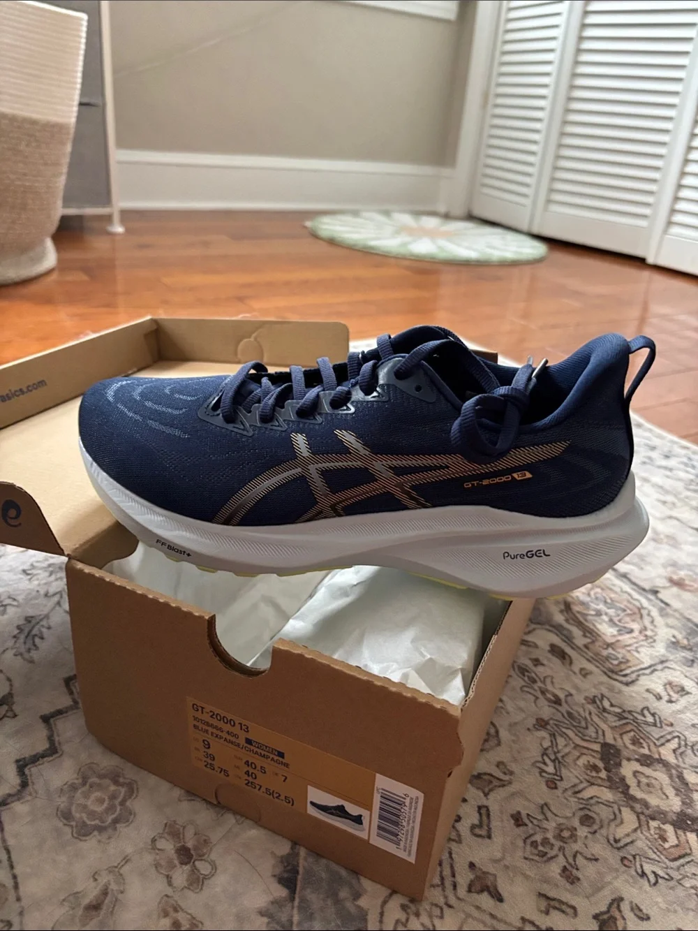 ASICS Navy Athletic Running Shoes with Gold Accents GT 2000 13 - Picture 1 of 8